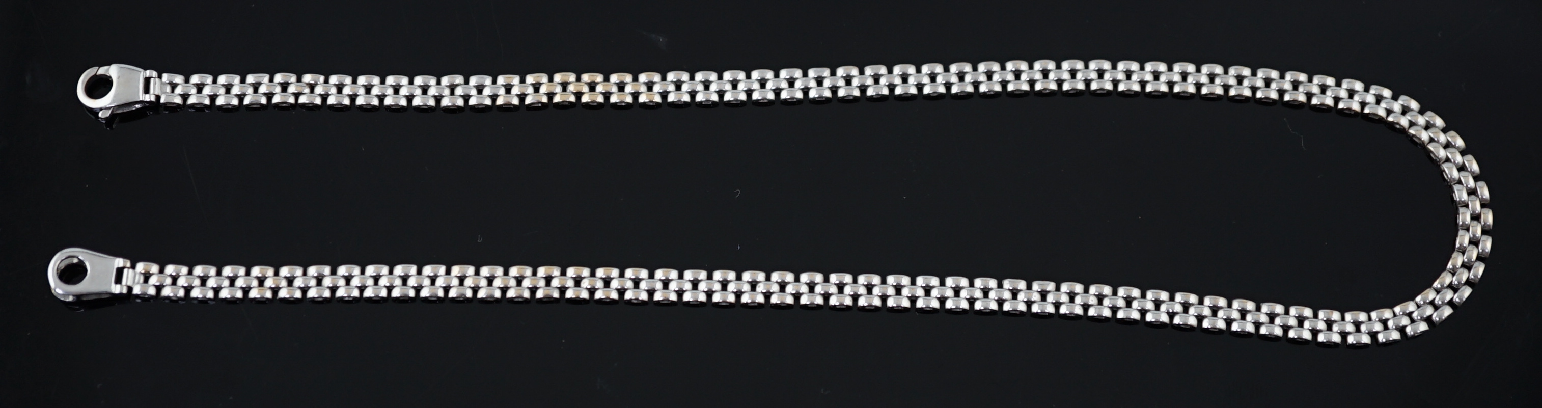 A modern Italian 18k white gold triple row link necklace